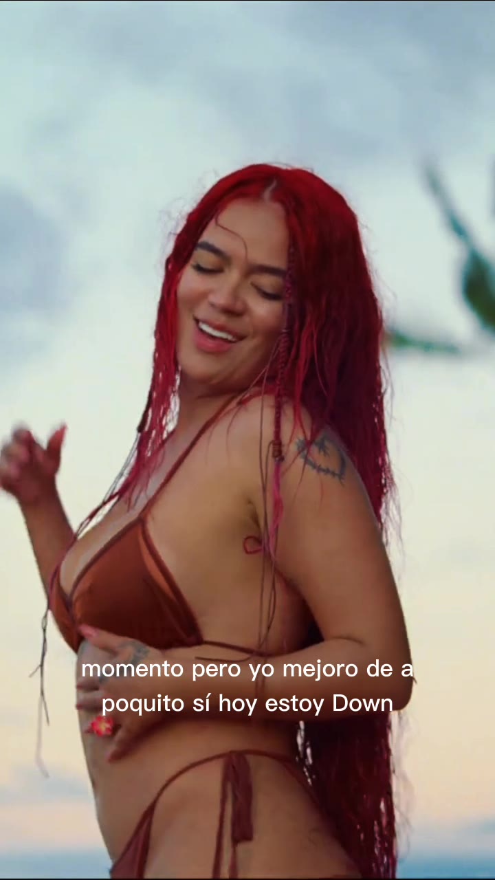 Karol G – Sexy babe on beach…
